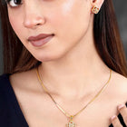 CZ Petal Perfection Pendant Set. Gold-plated pendant set with a floral design with earrings & CZ stones.