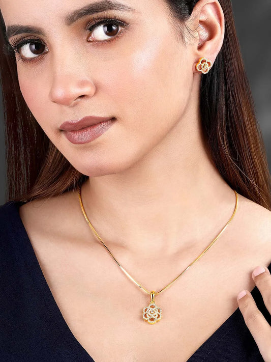 CZ Petal Perfection Pendant Set. Gold-plated pendant set with a floral design with earrings & CZ stones.