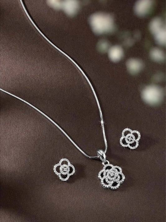 CZ Petal Perfection Pendant Set. Silver-plated pendant set with a floral design with earrings & CZ stones.