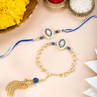 Close-up of Intricate Meena Work Rakhi Set for Couple featuring blue & gold thread, beads work, and gold plating – ideal for Raksha Bandhan | Peora
