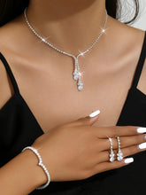 White necklace earrings set crafted from alloy, adorned with cubic zirconia & crystals for an elegant, timeless look | Peora
