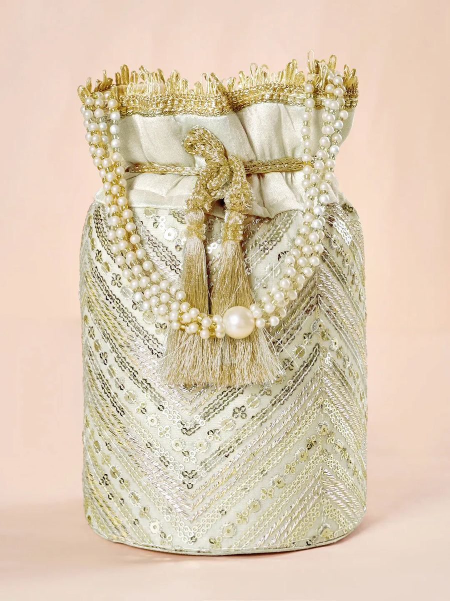 Cream potli bag named Handcrafted Ethnic Potli Purse, featuring artificial beads detailing and soft fabric texture | Peora
