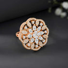 Regal Radiance Statement CZ Ring by Peora. Rose gold-plating adjustable ring, geometric floral pattern with cubic zirconia.