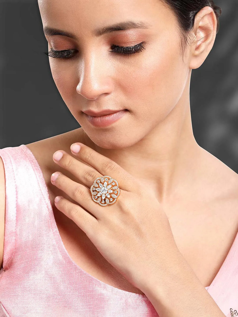 Regal Radiance Statement CZ Ring by Peora. Rose gold-plating adjustable ring, geometric floral pattern with cubic zirconia.