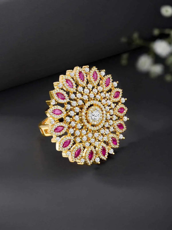 Bold Radiant Statement CZ Ring by Peora. Gold-Plated Adjustable ring with cubic zirconia in a radiant pattern, central larger crystal surrounded by smaller crystals in red.