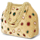 Gold potli bag named Embellished Ethnic Potli with Pearls, featuring faux emerald detailing and soft fabric texture | Peora
