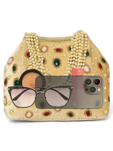 Gold potli bag named Embellished Ethnic Potli with Pearls, featuring faux emerald detailing and soft fabric texture | Peora
