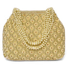 Gold potli bag named Vintage Pearl Embellished Potli, featuring faux pearl detailing and soft fabric texture | Peora
