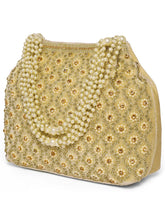 Gold potli bag named Vintage Pearl Embellished Potli, featuring faux pearl detailing and soft fabric texture | Peora
