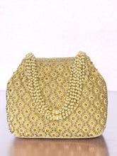 Gold potli bag named Vintage Pearl Embellished Potli, featuring faux pearl detailing and soft fabric texture | Peora
