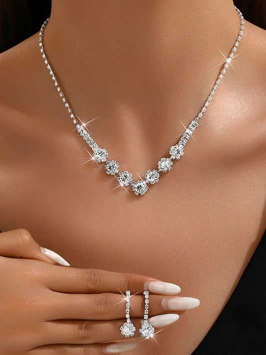 Silver necklace earrings set crafted from alloy, adorned with crystals & cubic zirconia for an elegant, timeless look | Peora
