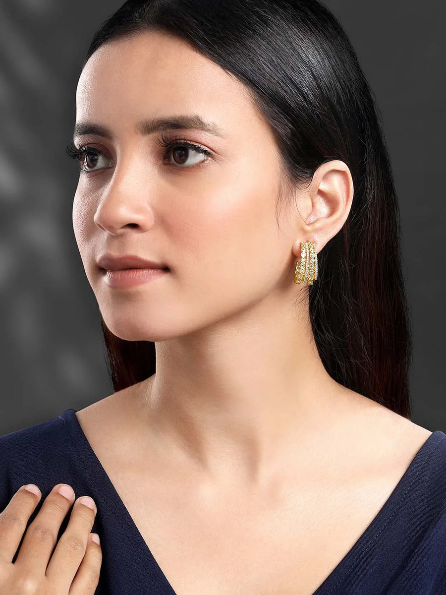 Glamorous Radiant CZ Half Hoop Earrings. A pair of gold-colored half hoop earrings with cubic zirconia embellishments. Ideal for casuals & party looks.