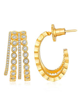 Glamorous Radiant CZ Half Hoop Earrings. A pair of gold-colored half hoop earrings with cubic zirconia embellishments. Ideal for casuals & party looks.