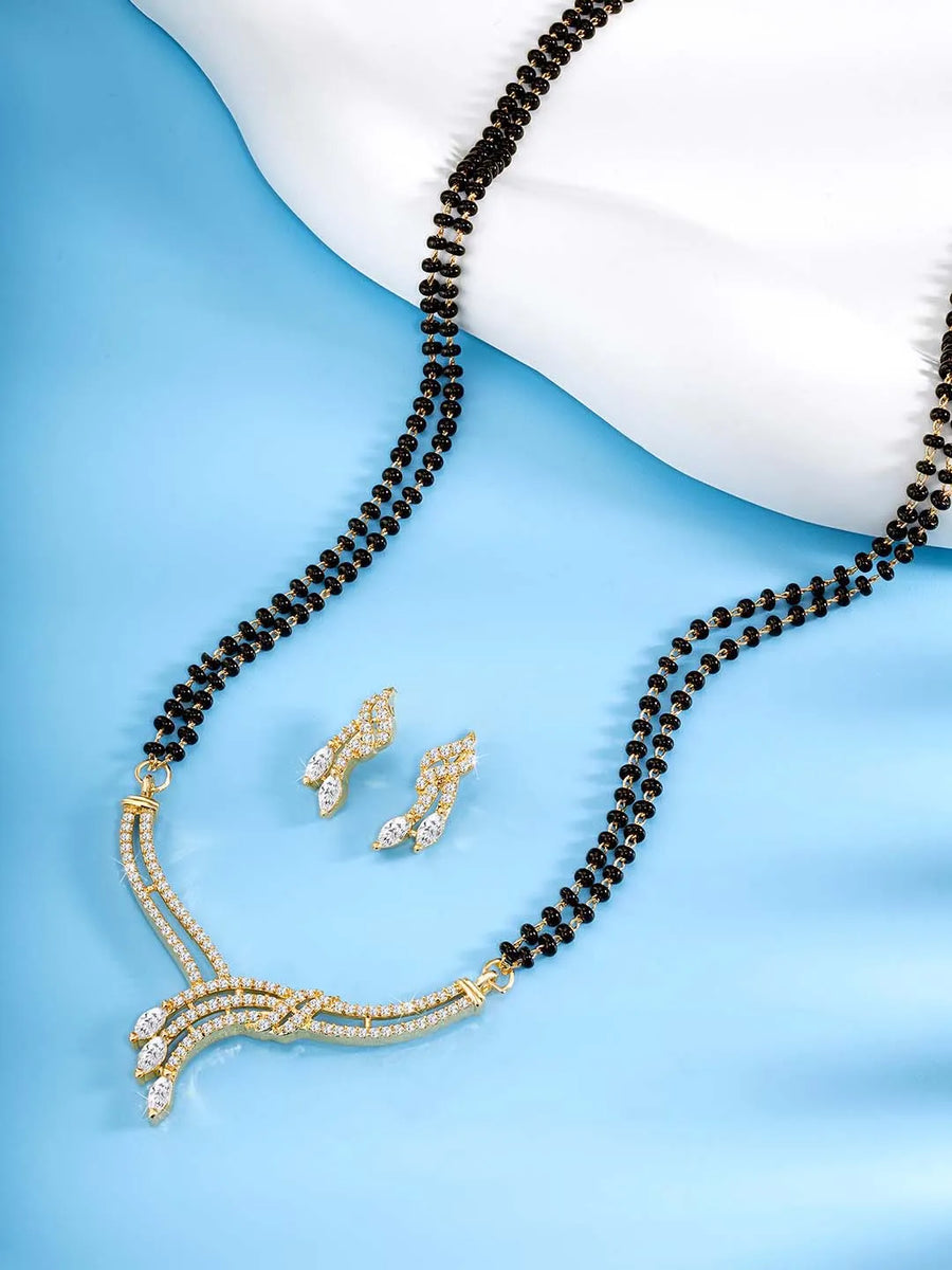 Brilliant Dazzling CZ Mangalsutra Set. Gold CZ mangalsutra set with black beads and matching earrings