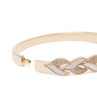 Contemporary Criss-Cross Kada Bracelet in Gold featuring Cubic Zirconia kada bracelet  
