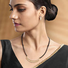 Stunning Radiant CZ Mangalsutra Set. Gold CZ mangalsutra set with black beads and matching earrings, in teardrop shape.