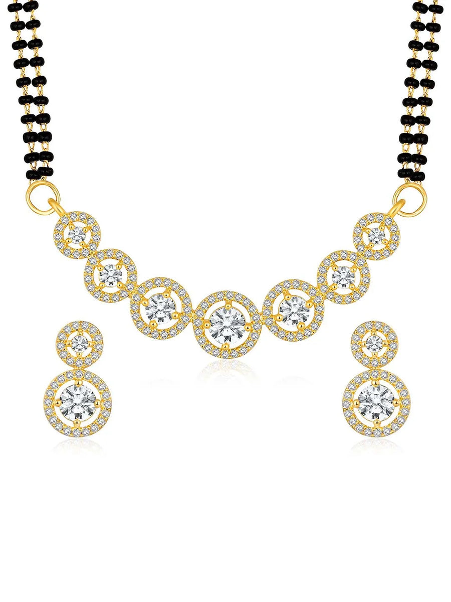Luxurious Gleaming CZ Mangalsutra Set. Mangalsutra and matching earrings with cubic zirconia stones along with gold plating.