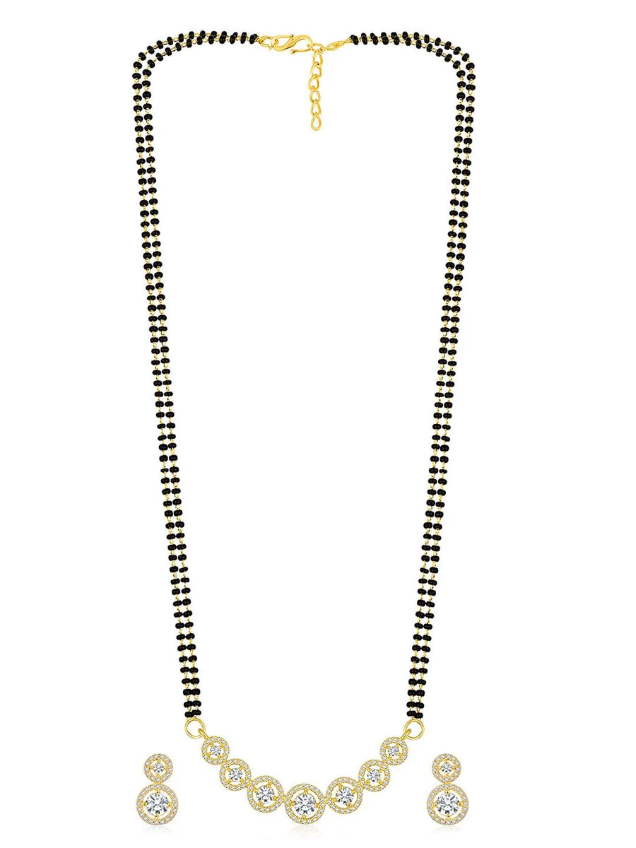 Luxurious Gleaming CZ Mangalsutra Set. Mangalsutra and matching earrings with cubic zirconia stones along with gold plating.