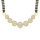 Luxurious Gleaming CZ Mangalsutra Set. Mangalsutra and matching earrings with cubic zirconia stones along with gold plating.