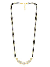 Luxurious Gleaming CZ Mangalsutra Set. Mangalsutra and matching earrings with cubic zirconia stones along with gold plating.