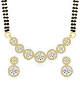 Luxurious Gleaming CZ Mangalsutra Set. Mangalsutra and matching earrings with cubic zirconia stones along with gold plating.
