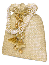 Gold potli bag named Brocade Potli with Pearl Tassel Handle, featuring artificial beads detailing and soft fabric texture | Peora
