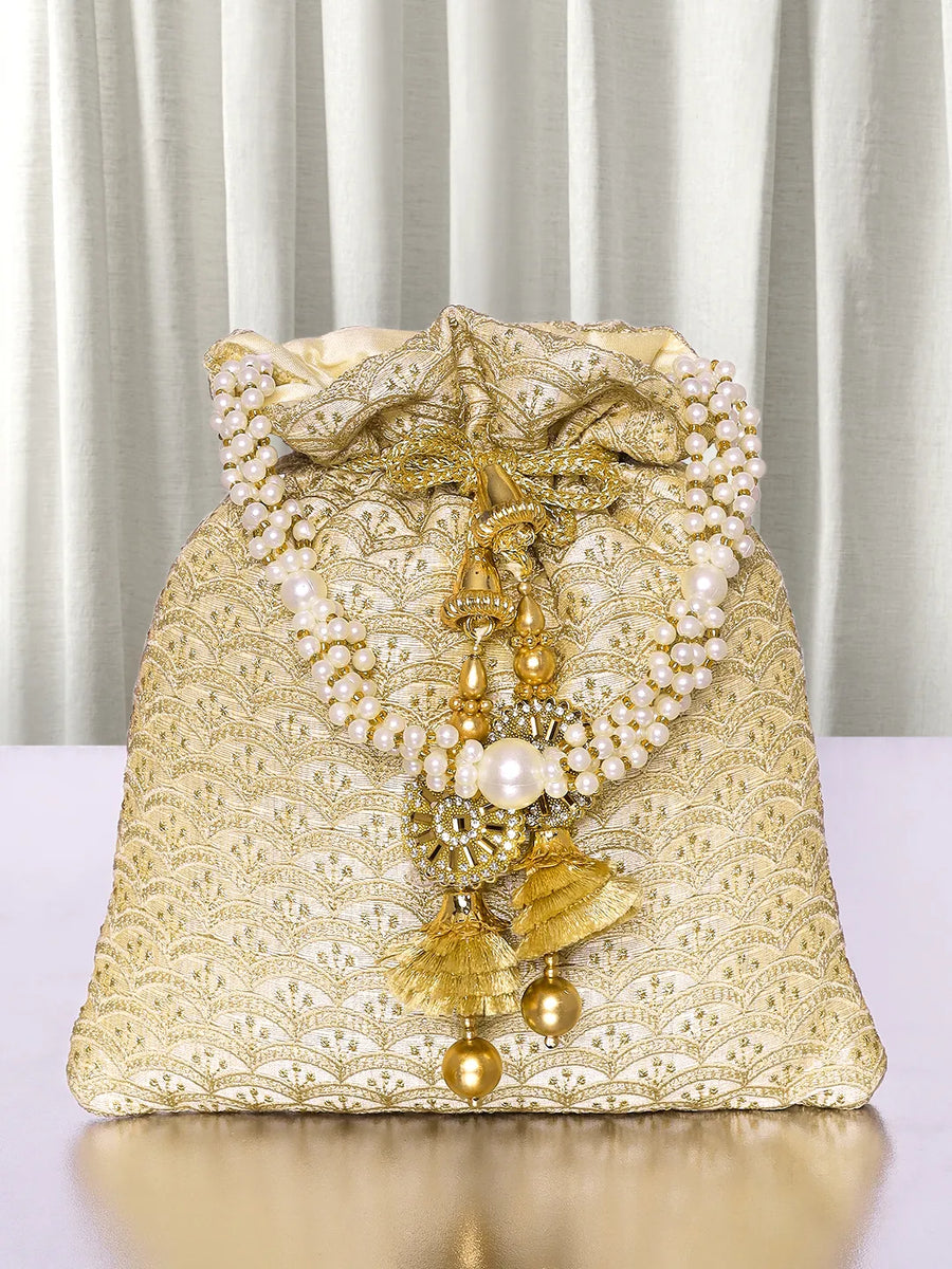Gold potli bag named Brocade Potli with Pearl Tassel Handle, featuring artificial beads detailing and soft fabric texture | Peora
