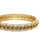 Grand Textured Finish Bangle Set in Green featuring Faux Kundan & Beads bangle set 
