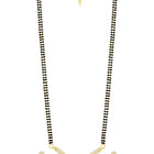 CZ Studded Traditional Mangalsutra Set. A traditional mangalsutra set with black beads and gold-color plating, zirconia stones, & matching earrings.