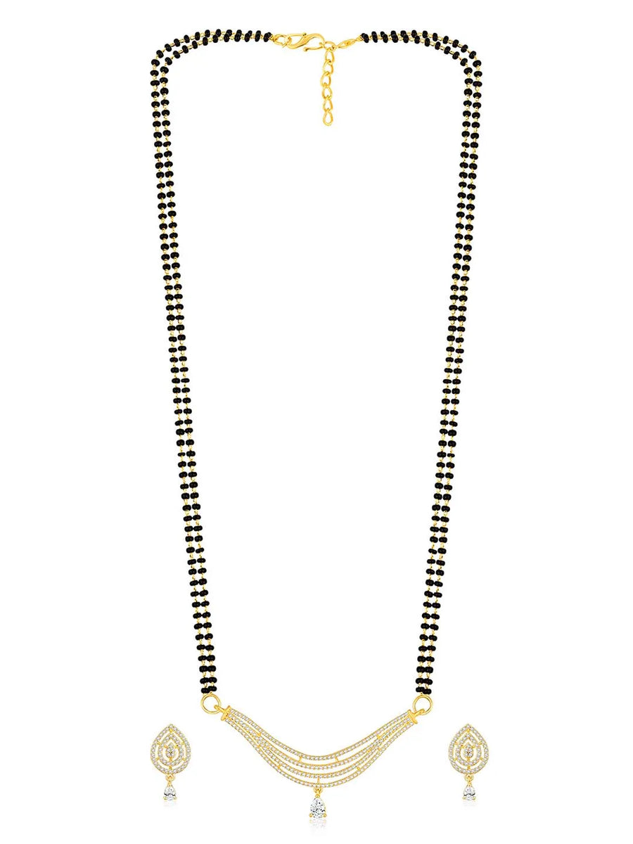 CZ Studded Traditional Mangalsutra Set. A traditional mangalsutra set with black beads and gold-color plating, zirconia stones, & matching earrings.