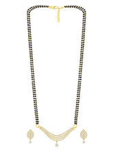 CZ Studded Traditional Mangalsutra Set. A traditional mangalsutra set with black beads and gold-color plating, zirconia stones, & matching earrings.