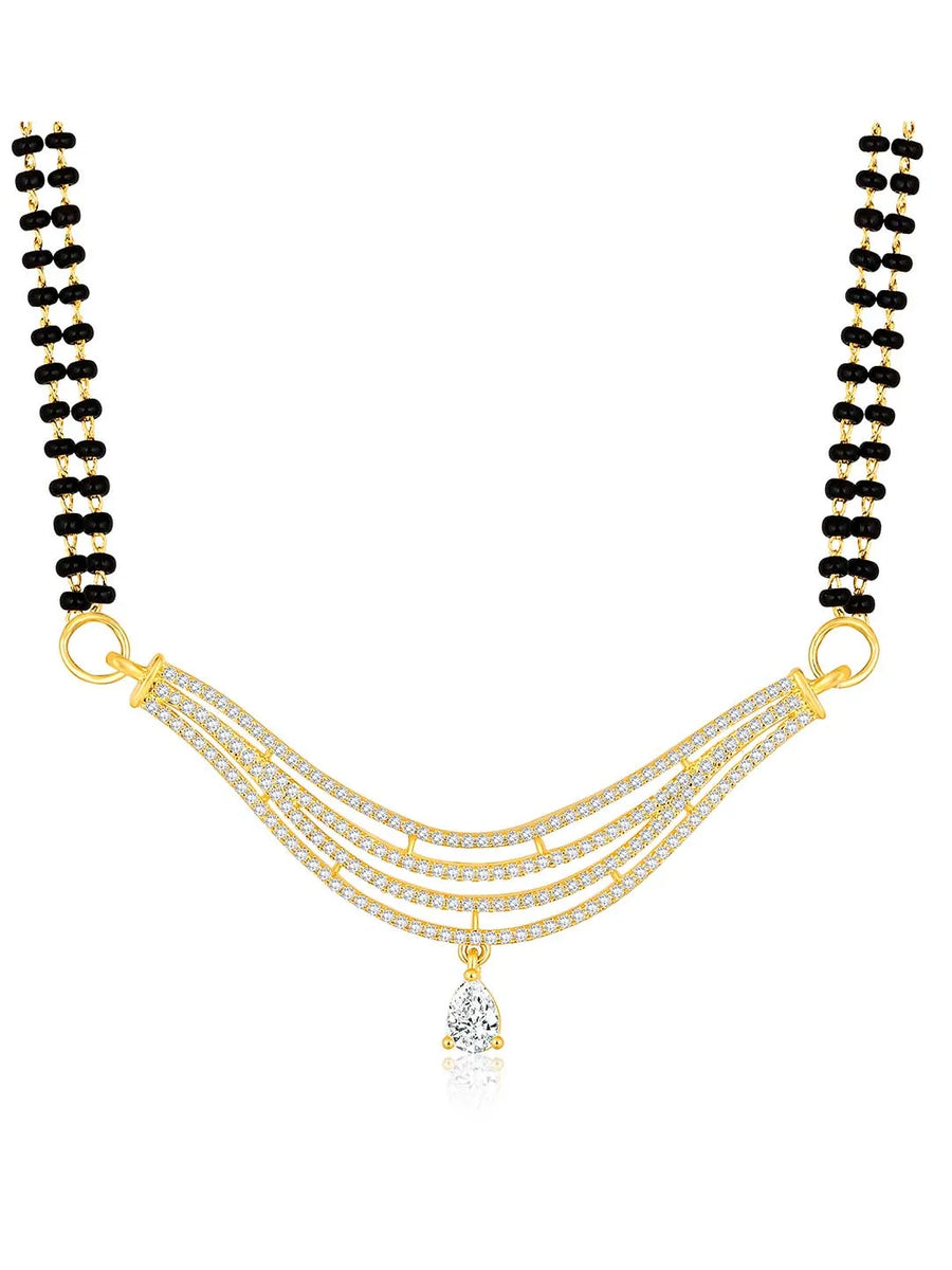 CZ Studded Traditional Mangalsutra Set. A traditional mangalsutra set with black beads and gold-color plating, zirconia stones, & matching earrings.