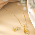 Timeless Divine Droplets CZ Pendant Set. Gold-plating pendant necklace and earrings set, leaf accent with cubic zirconia stones by Peora.