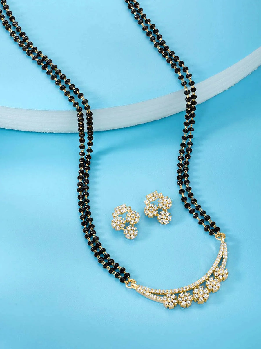 Sparkling CZ Wedding Mangalsutra. A set of sparkling CZ wedding mangalsutra, with earrings, gold colour and cubic zirconia stones.