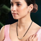 Sparkling CZ Wedding Mangalsutra. A set of sparkling CZ wedding mangalsutra, with earrings, gold colour and cubic zirconia stones.