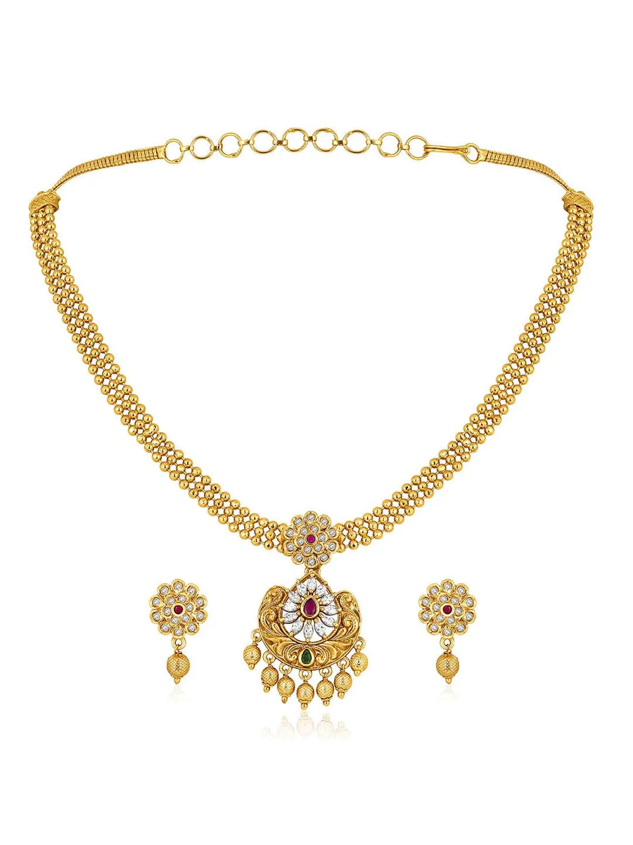 Luxurious Golden Glamour Necklace Set. Necklace set with floral patterns and pink, green & white stones.