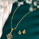 Sparkling Rhombus CZ Pendant Set by Peora. Gold-colored pendant set with a rhombus-shaped design with earrings & CZ stones.