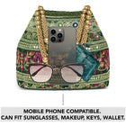 Green potli bag named Floral Threadwork Potli with Bead Handle, featuring artificial beads detailing and soft fabric texture | Peora
