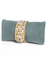 Grey clutch bag named Clutch Bags Crafted for Elegance, featuring pearl detailing and soft fabric texture | Peora
