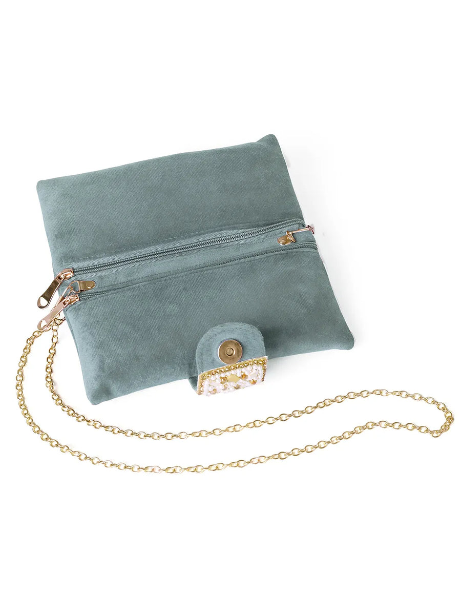 Grey clutch bag named Clutch Bags Crafted for Elegance, featuring pearl detailing and soft fabric texture | Peora
