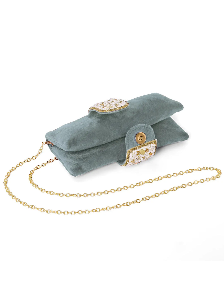 Grey clutch bag named Clutch Bags Crafted for Elegance, featuring pearl detailing and soft fabric texture | Peora
