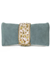 Grey clutch bag named Clutch Bags Crafted for Elegance, featuring pearl detailing and soft fabric texture | Peora
