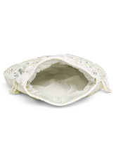 White potli bag named Handcrafted Pearl Potli Styles, featuring pearl detailing and soft fabric texture | Peora

