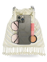 White potli bag named Handcrafted Pearl Potli Styles, featuring pearl detailing and soft fabric texture | Peora
