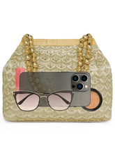 Gold potli bag named Handmade Zari Sequin Potli Bag, featuring artificial beads detailing and soft fabric texture | Peora
