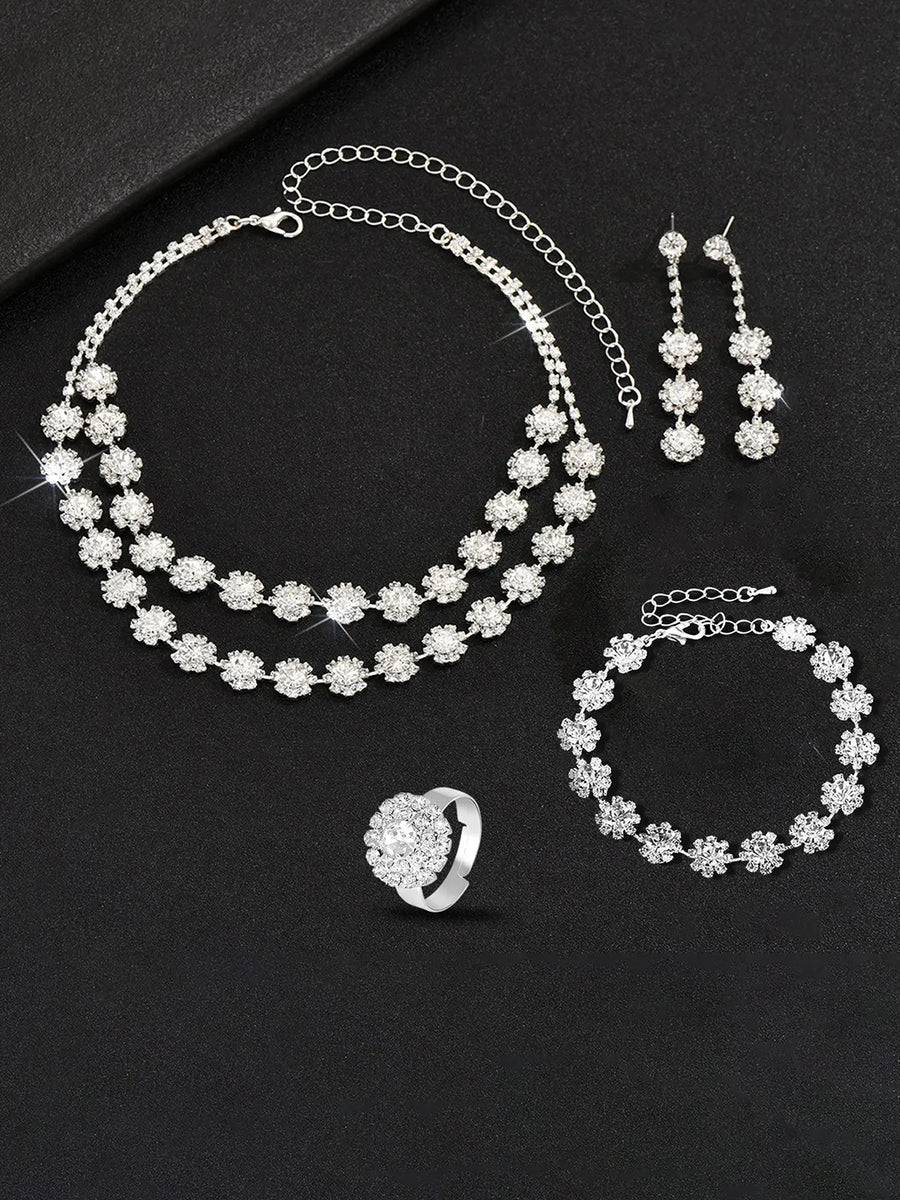 White necklace earrings bracelet ring set crafted from alloy, adorned with crystals & cubic zirconia for an elegant, timeless look | Peora
