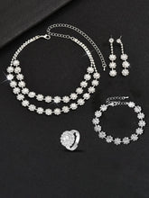 White necklace earrings bracelet ring set crafted from alloy, adorned with crystals & cubic zirconia for an elegant, timeless look | Peora
