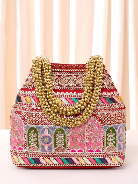 Maroon potli bag named Ethnic Embroidered Potli Purse, featuring artificial beads detailing and soft fabric texture | Peora
