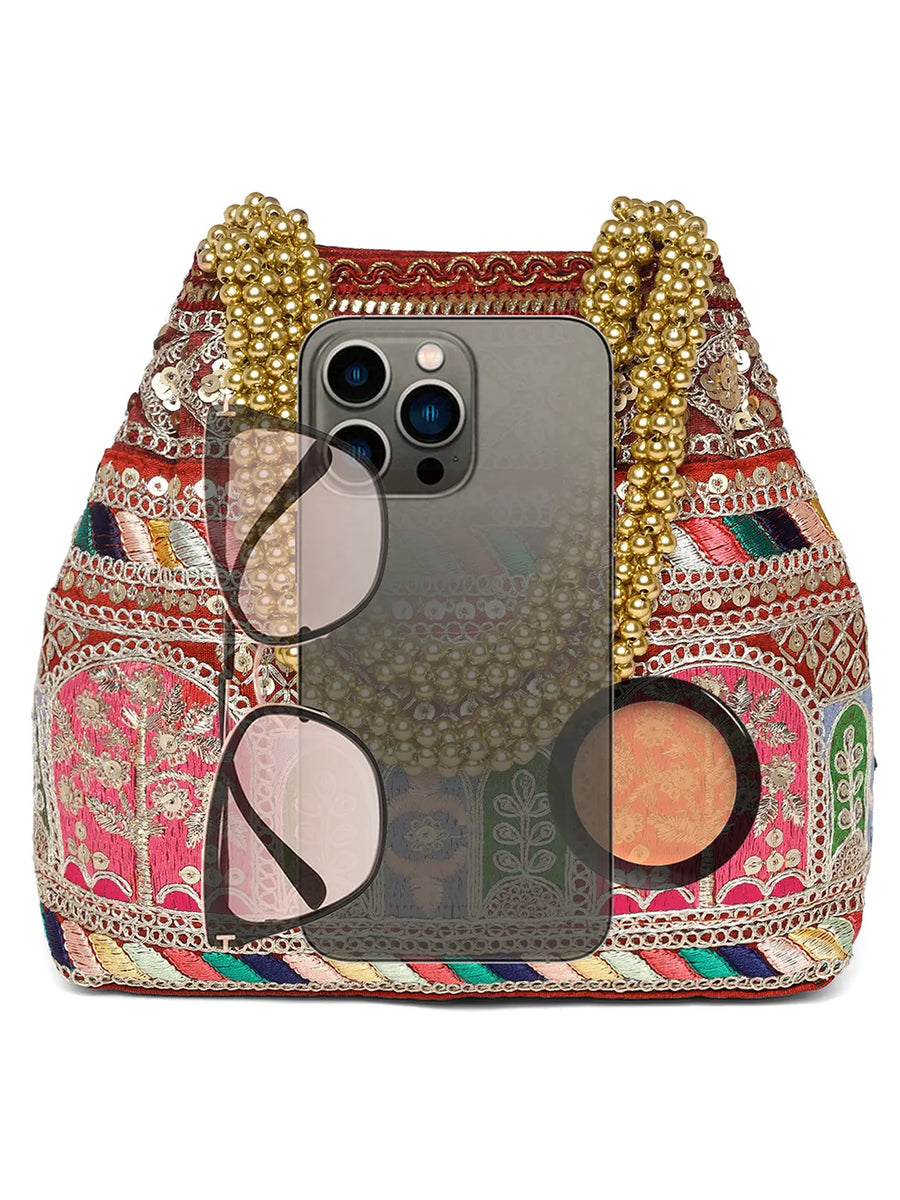 Maroon potli bag named Ethnic Embroidered Potli Purse, featuring artificial beads detailing and soft fabric texture | Peora
