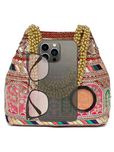 Maroon potli bag named Ethnic Embroidered Potli Purse, featuring artificial beads detailing and soft fabric texture | Peora
